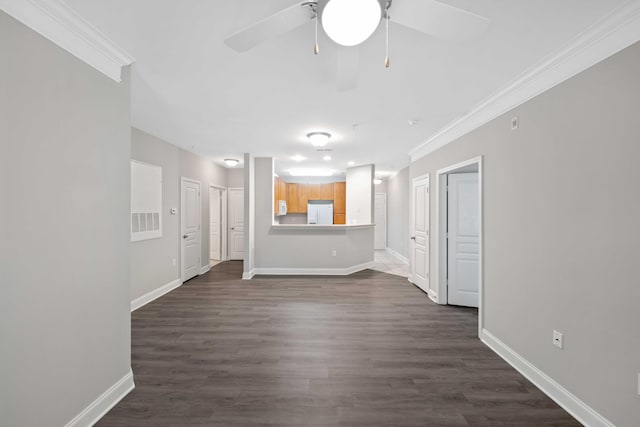 unfurnished living room featuring dark hardwood / wood-style flooring, ceiling fan, and ornamental molding