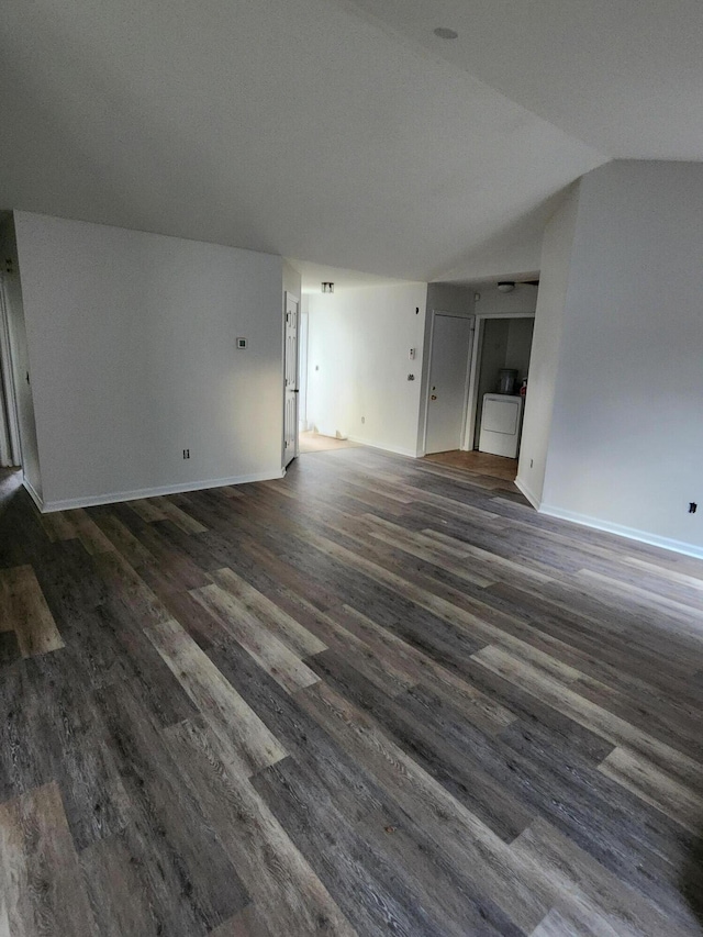 315 Indigo Rd, Goose Creek, SC 29445 - unfurnished living room featuring dark wood-type flooring, baseboards, and lofted ceiling