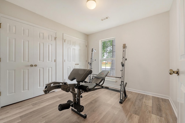 315 Indigo Rd, Goose Creek, SC 29445 - workout room with wood finished floors, visible vents, and baseboards