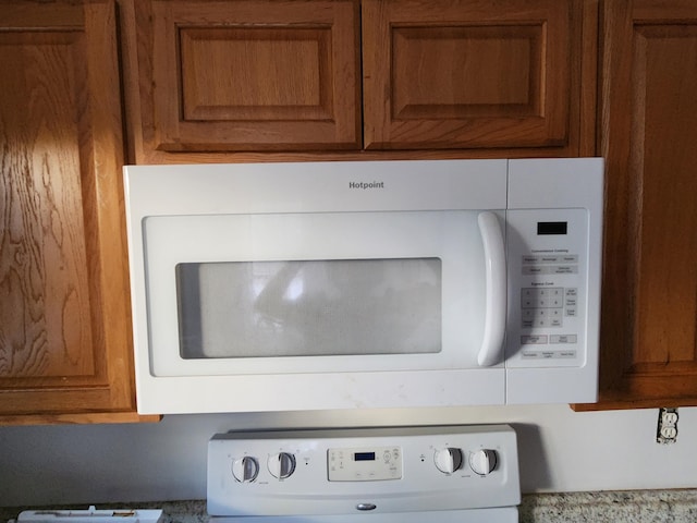 315 Indigo Rd, Goose Creek, SC 29445 - details with white microwave and brown cabinets