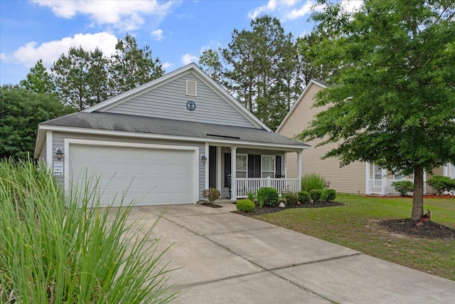 ranch-style house with driveway, roof with shingles, covered porch, and an attached garage