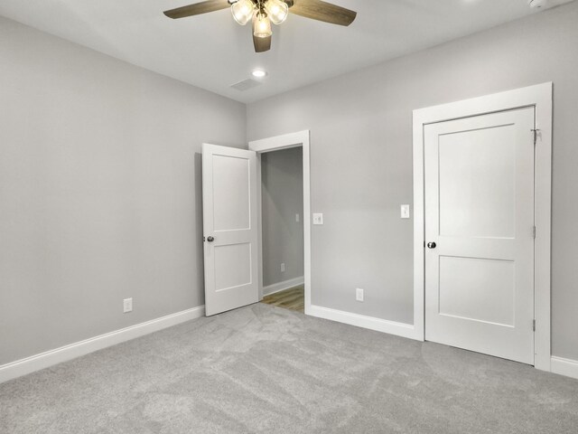 4566 Durant Ave, North Charleston, SC 29405 - unfurnished bedroom featuring carpet floors, baseboards, and a ceiling fan