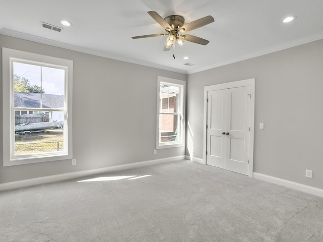 4566 Durant Ave, North Charleston, SC 29405 - empty room featuring carpet flooring, ceiling fan, baseboards, crown molding, and recessed lighting