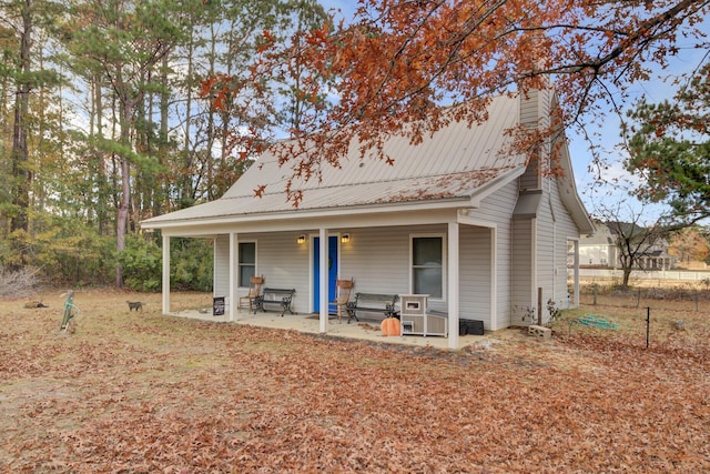 rear view of property with a patio area