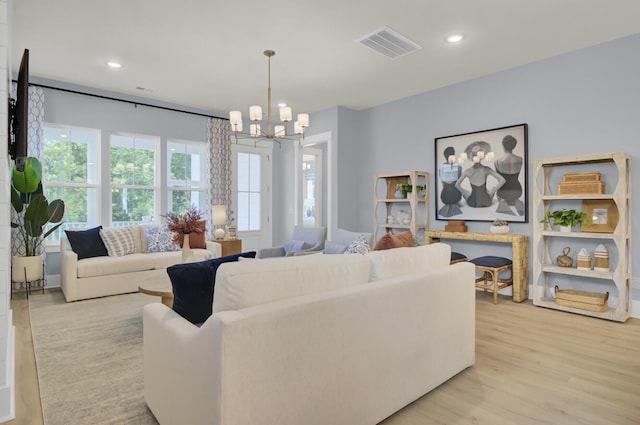 3041 Robeson Trce, Johns Island, SC 29455 - living room featuring a chandelier, light wood-style floors, and recessed lighting