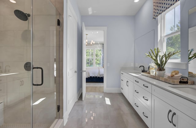 3041 Robeson Trce, Johns Island, SC 29455 - full bath featuring double vanity, a stall shower, marble finish floors, connected bathroom, and recessed lighting
