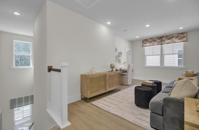 3041 Robeson Trce, Johns Island, SC 29455 - living area with light wood finished floors, recessed lighting, and baseboards