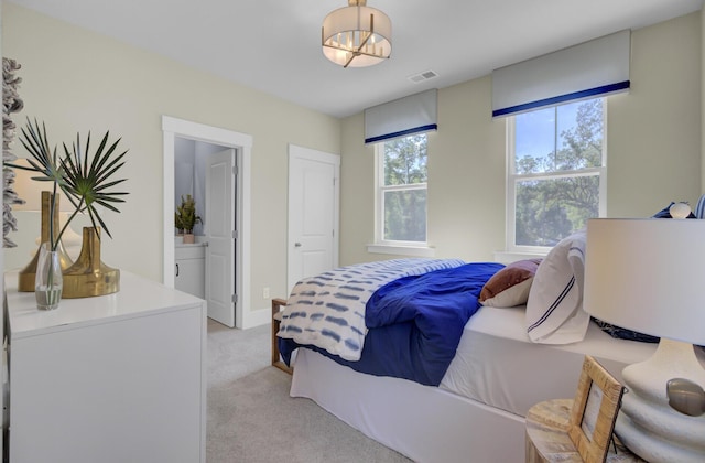 3041 Robeson Trce, Johns Island, SC 29455 - bedroom featuring light carpet and ensuite bathroom