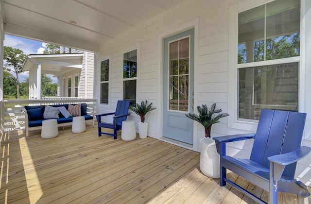 3041 Robeson Trce, Johns Island, SC 29455 - wooden deck with an outdoor living space
