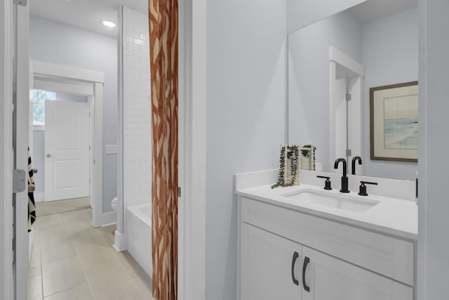 3041 Robeson Trce, Johns Island, SC 29455 - full bathroom featuring vanity, shower / bathtub combination with curtain, tile patterned flooring, recessed lighting, and baseboards
