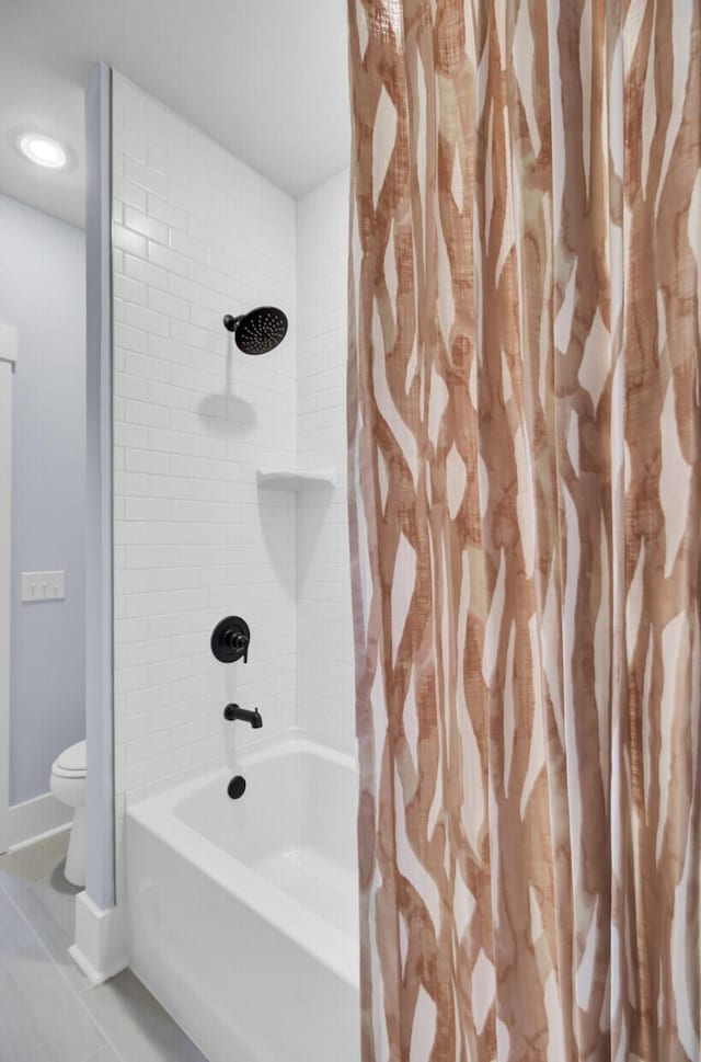 3041 Robeson Trce, Johns Island, SC 29455 - full bathroom featuring toilet, shower / bathtub combination with curtain, baseboards, and tile patterned flooring