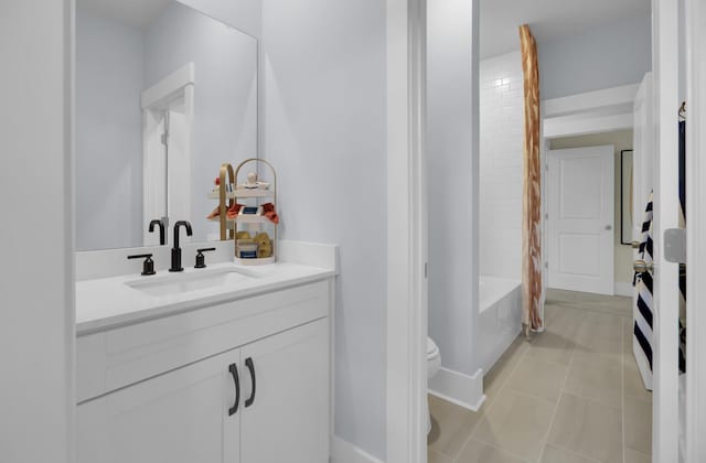3041 Robeson Trce, Johns Island, SC 29455 - bathroom with toilet, vanity, shower / bathtub combination with curtain, tile patterned flooring, and baseboards