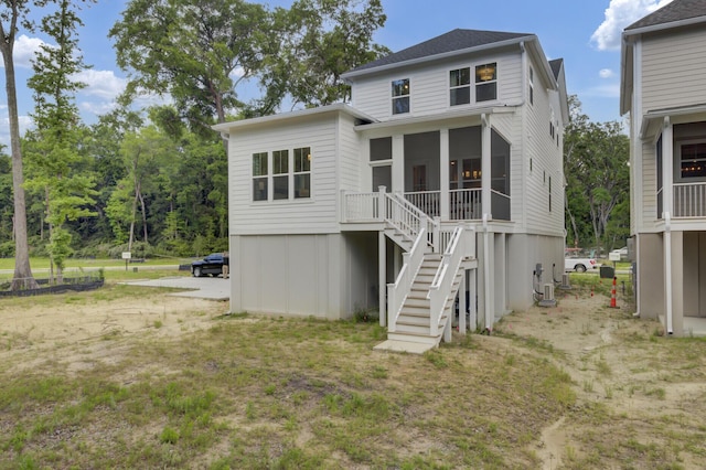 3041 Robeson Trce, Johns Island, SC 29455 - back of property with stairway and a sunroom