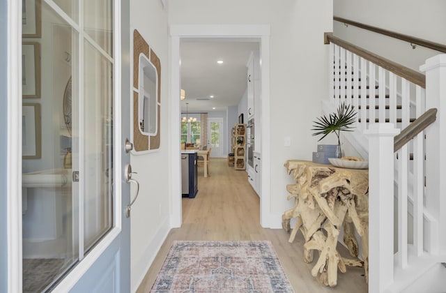 3041 Robeson Trce, Johns Island, SC 29455 - entryway with light wood-style floors, stairway, recessed lighting, a chandelier, and baseboards
