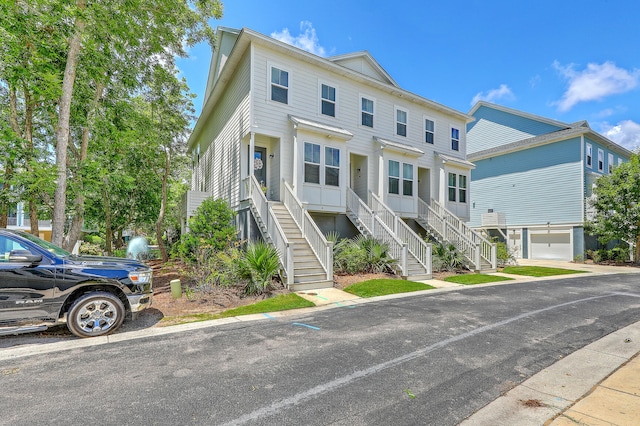129 Howard Mary Dr Unit A, Charleston, SC 29412 - multi unit property featuring stairs and an attached garage