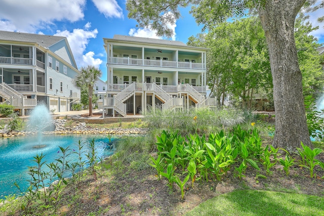 129 Howard Mary Dr Unit A, Charleston, SC 29412 - rear view of property featuring a ceiling fan, stairway, and covered porch