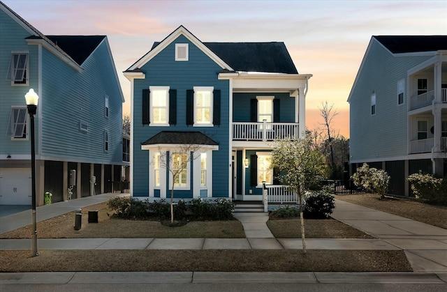 view of front of home with a balcony