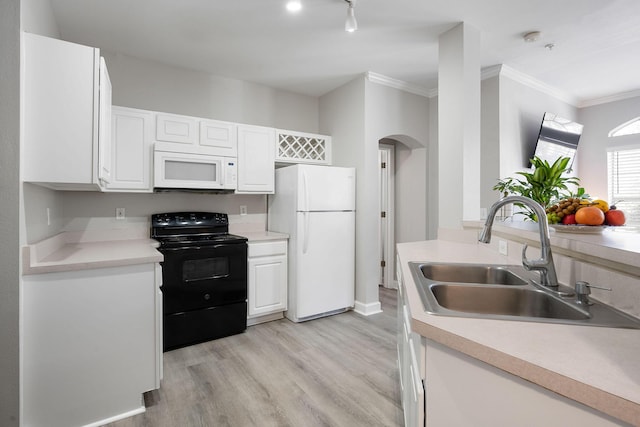 kitchen featuring light wood-type flooring, ornamental molding, a sink, white cabinetry, and white appliances