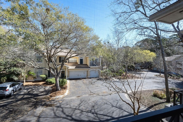 exterior space featuring a garage and driveway