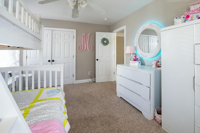 bedroom with ceiling fan and carpet flooring