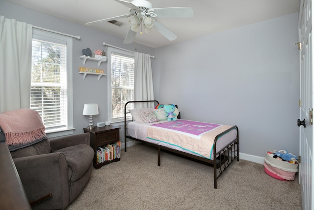 bedroom with light carpet and ceiling fan