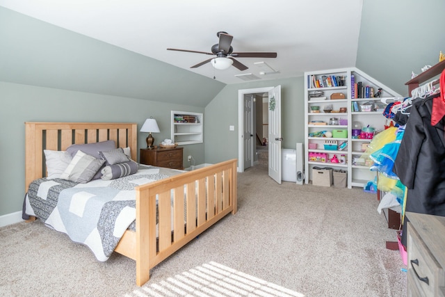 carpeted bedroom featuring ceiling fan and lofted ceiling