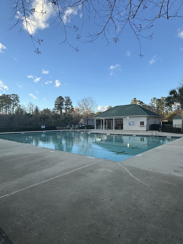 view of swimming pool featuring a patio