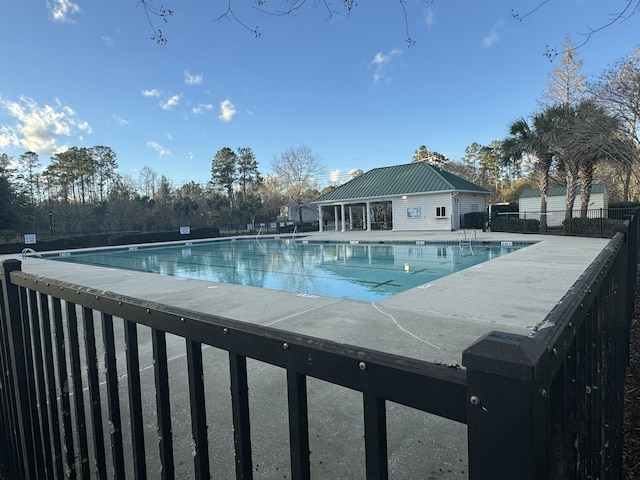 view of swimming pool featuring a patio area