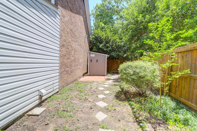 680 Buckhall Ct, Mount Pleasant, SC 29464 - fenced backyard featuring a storage unit and an outbuilding