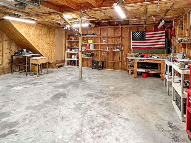 104 Bryant St, Saint George, SC 29477 - unfinished basement featuring a workshop area