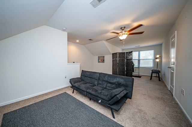 living room with lofted ceiling, light carpet, and ceiling fan