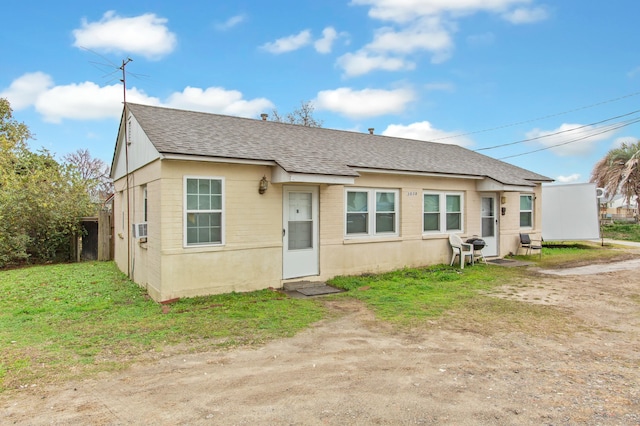 view of front of home with cooling unit