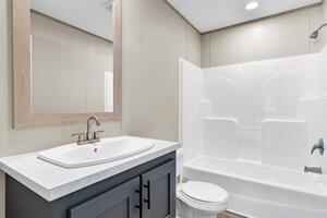 119 Silver King Ave, Cross, SC 29436 - bathroom featuring toilet, shower / tub combination, and vanity