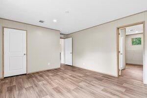 119 Silver King Ave, Cross, SC 29436 - empty room featuring wood finished floors