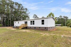 119 Silver King Ave, Cross, SC 29436 - view of front of house featuring crawl space and a front yard