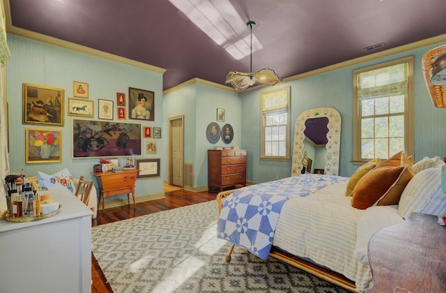 bedroom with crown molding and dark wood-type flooring