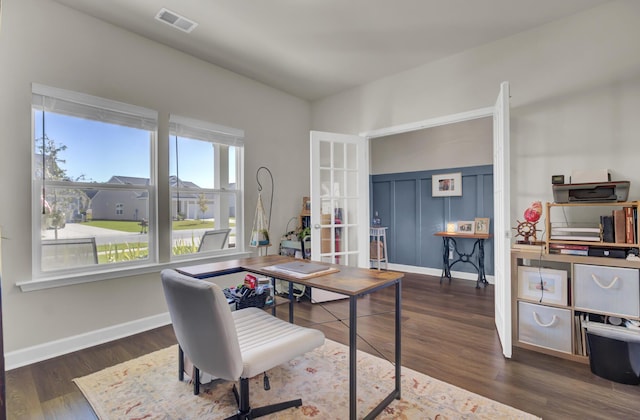 office with dark wood-type flooring