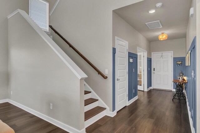 foyer featuring dark hardwood / wood-style floors