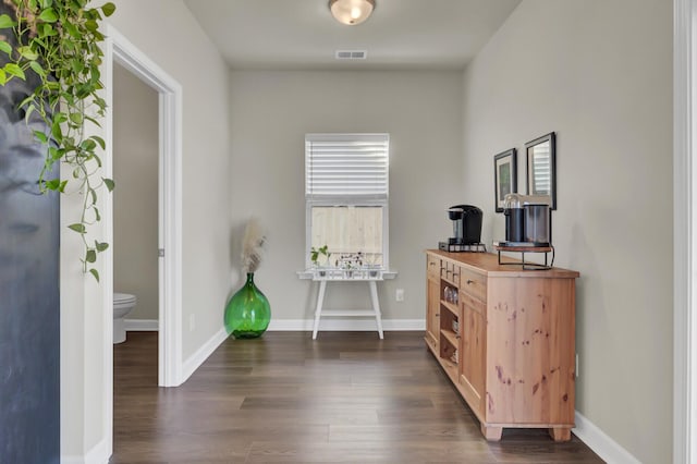 interior space with dark hardwood / wood-style floors