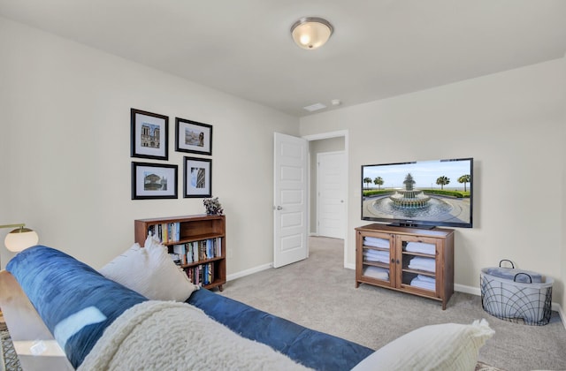 living room with light colored carpet