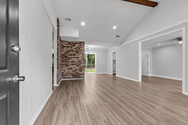 unfurnished living room with ceiling fan with notable chandelier, light wood-style floors, beamed ceiling, visible vents, and recessed lighting