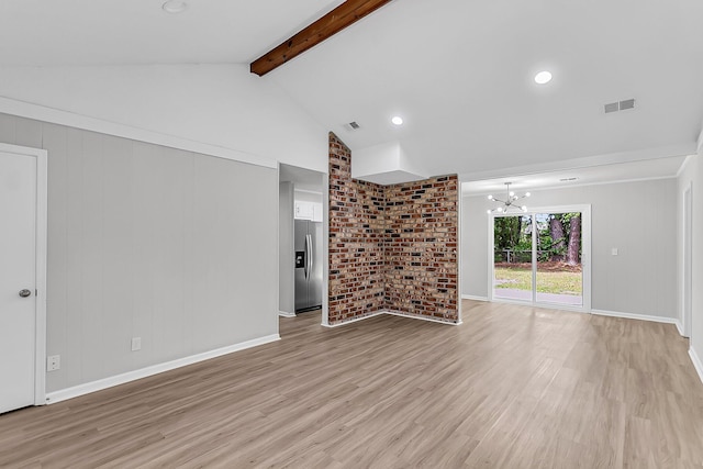 unfurnished living room with light wood-type flooring, visible vents, vaulted ceiling with beams, and an inviting chandelier