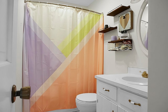 bathroom with oversized vanity and toilet