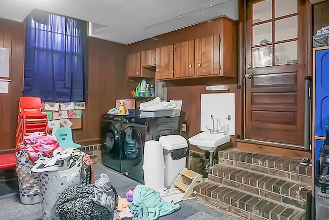 interior space with independent washer and dryer and sink