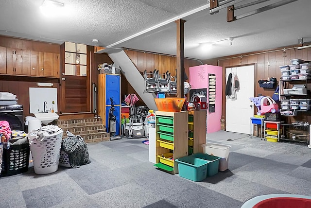 garage featuring wooden walls