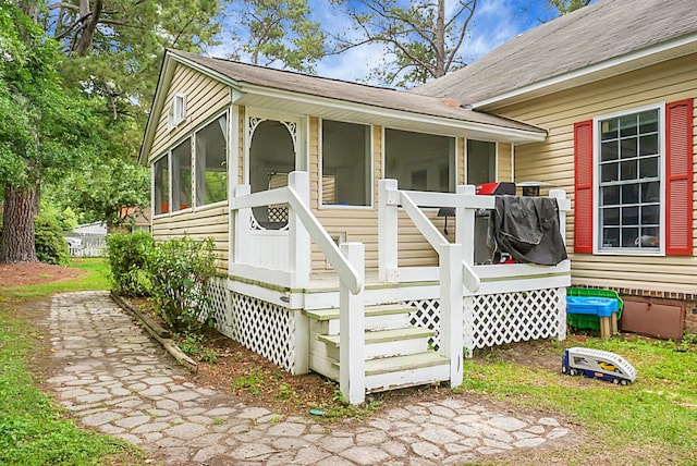 exterior space with a sunroom