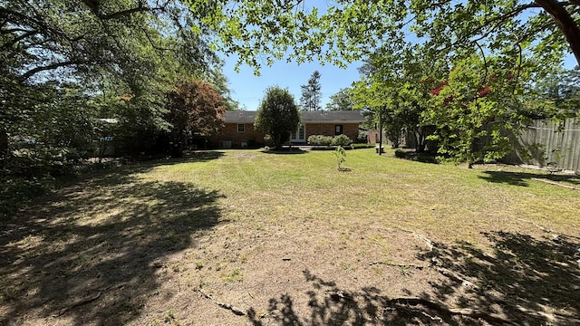 view of yard with fence