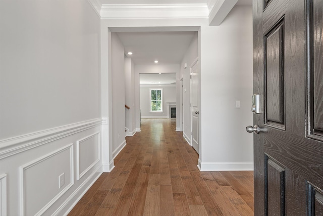 259 Huguenot Trl, Huger, SC 29450 - hall featuring dark wood finished floors, crown molding, and recessed lighting