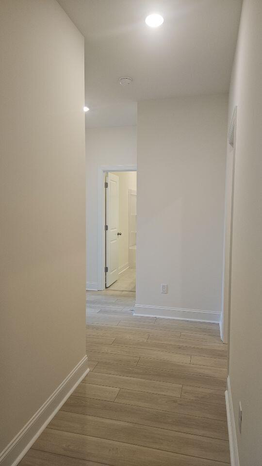 259 Huguenot Trl, Huger, SC 29450 - hallway with light wood finished floors and recessed lighting