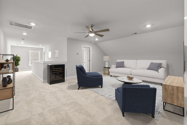 259 Huguenot Trl, Huger, SC 29450 - living room featuring wine cooler, carpet, recessed lighting, ceiling fan, and lofted ceiling